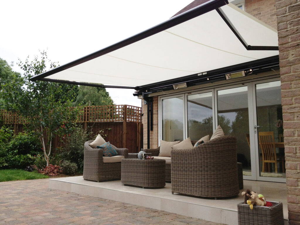 Extended retractable awning over patio in Wilburton