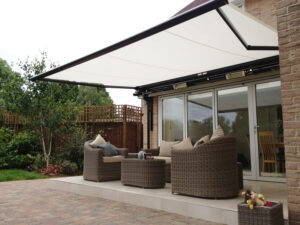 Extended retractable awning over patio in Wilburton