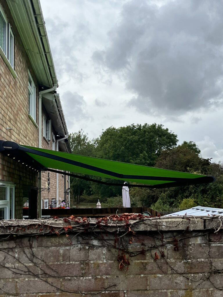 side view of patio awning installation in Meldreth