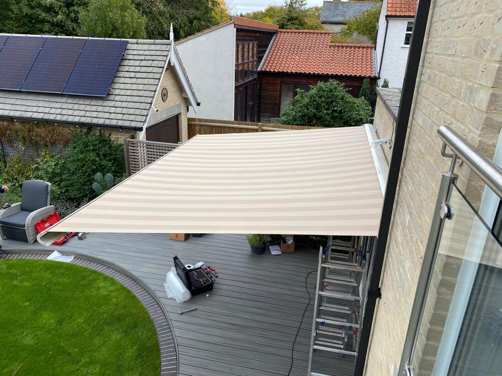 Weinor Opal Design awning viewed from a first-floor balcony above a decked garden